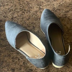 A pair of cute shoes a crop top and a shirt